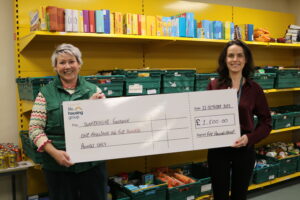 Fife Housing Group presents a £1,500 donation to Dunfermline Foodbank to support local families in need.