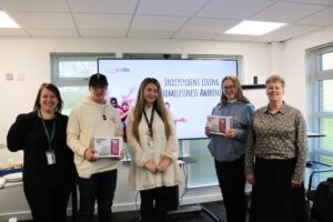 Photo shows participants of Fife Housing Group&rsquo;s Manage Your Home workshops receive tablets after completing sessions designed to build confidence in managing their first home.